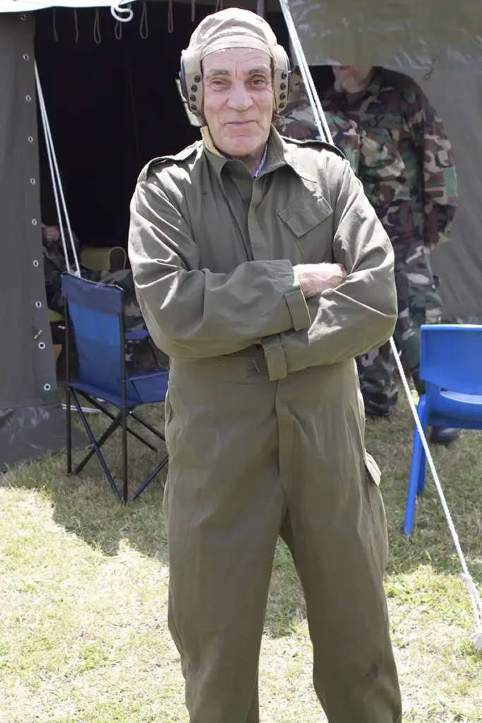 The museum's chairman dressed in a early era pilots outfit.