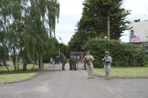 Members of the Heathens guarding the gate.